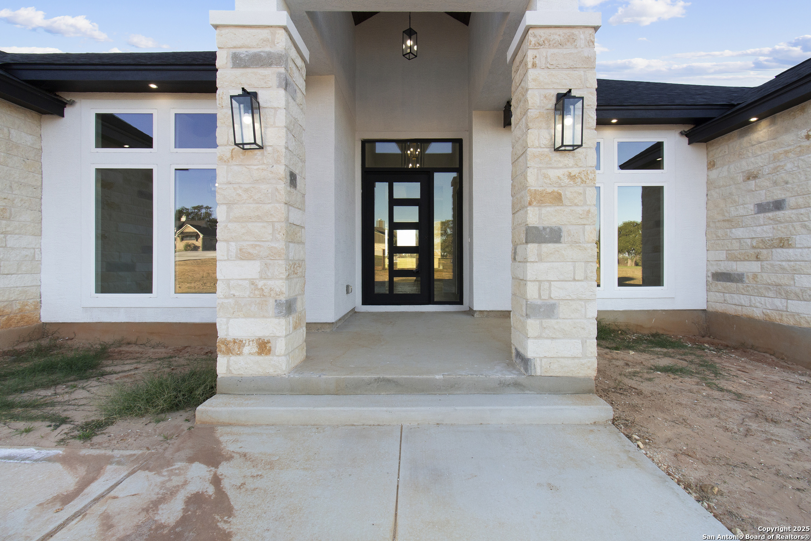 116 Western Way Adkins, TX 78101 - Photo 9 of 50 a front view of a house with a yard