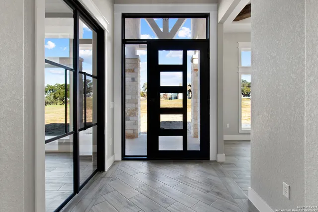 wooden floor in a room with a window