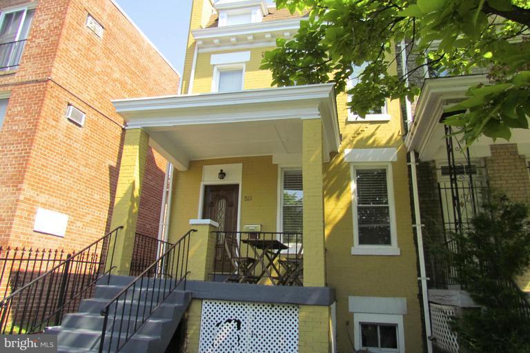 521 Columbia Road Northwest Washington, DC 20001 - Photo 1 of 1 a view of a house with a iron stairs