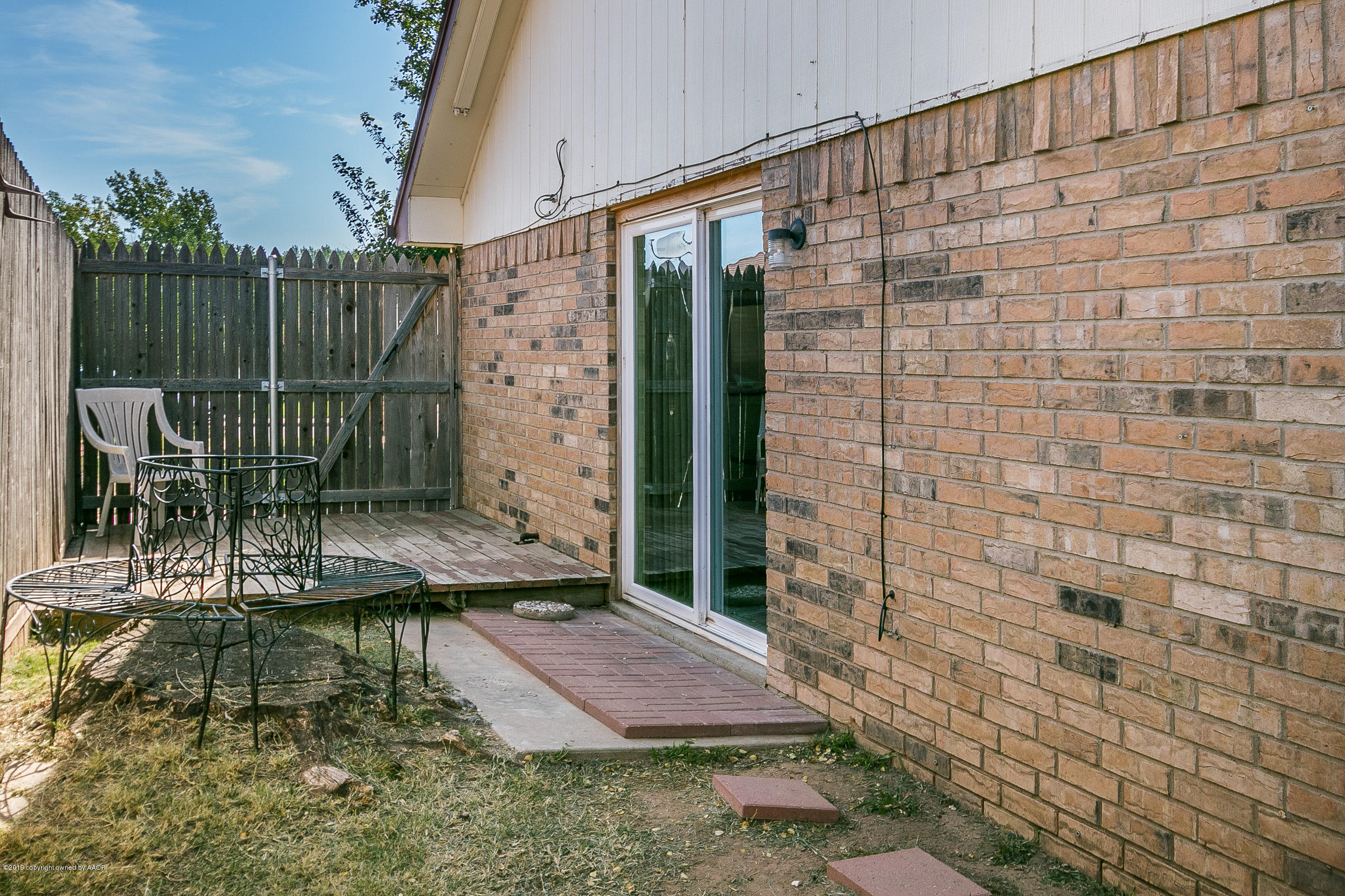 5312 Raindrop Lane Amarillo, TX 79110 - Photo 16 of 18 016_Yard and Patio