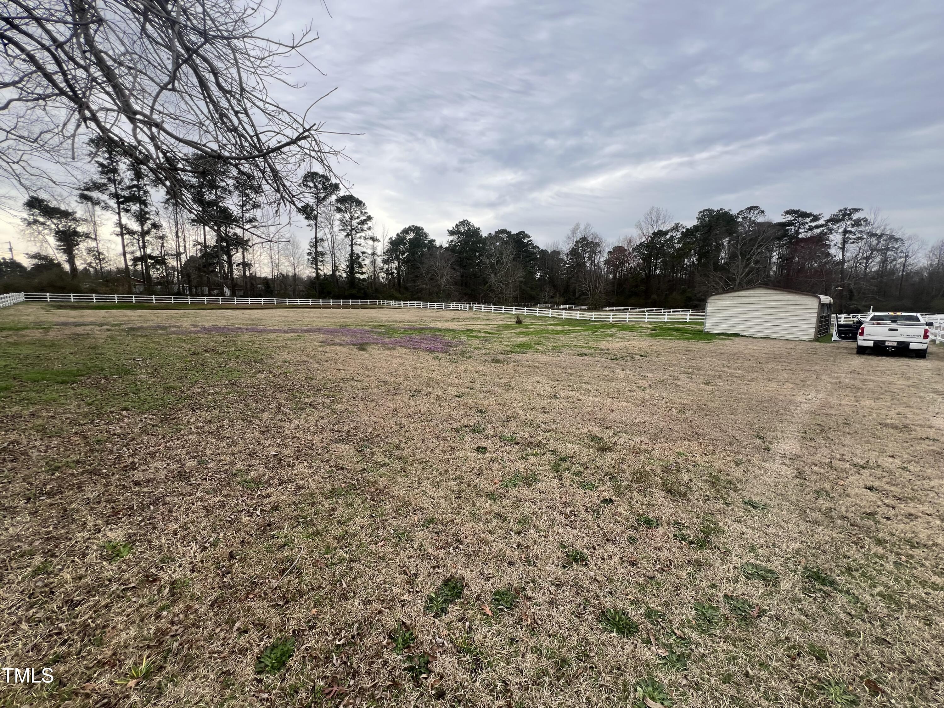 1800 Hobson Road Dunn, NC 28334 - Photo 25 of 45 a view of open field with trees