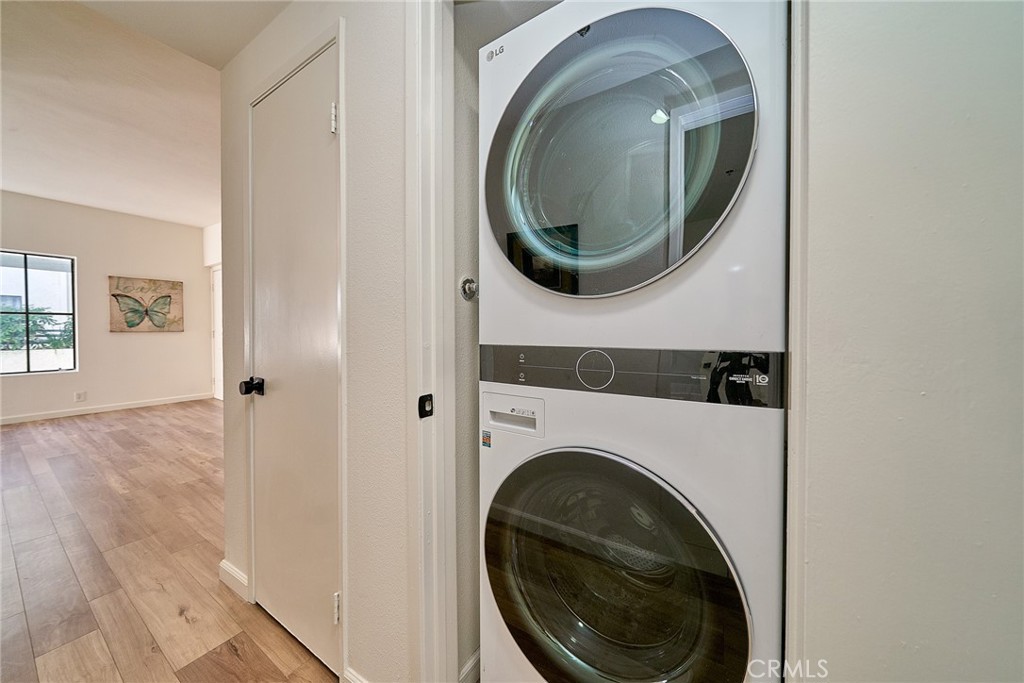 720 West 4th Street, Unit 305 Long Beach, CA 90802 - Photo 16 of 52 a utility room with dryer and washer
