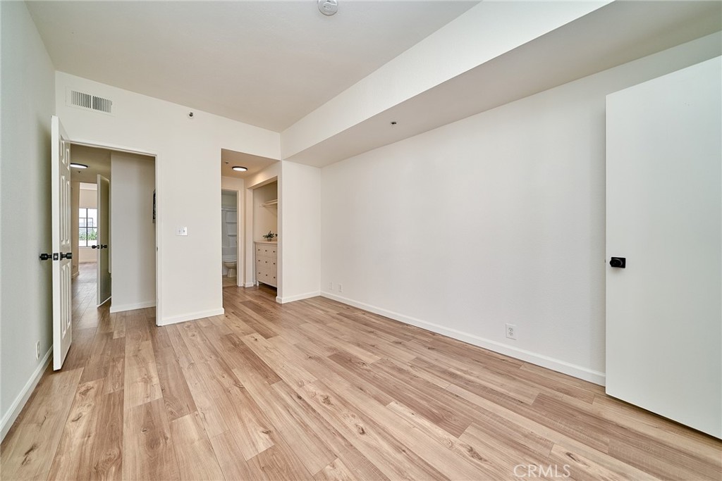 720 West 4th Street, Unit 305 Long Beach, CA 90802 - Photo 21 of 52 a view of empty room with wooden floor