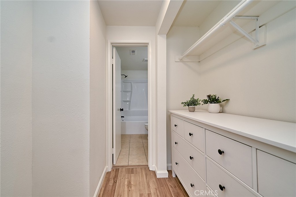 720 West 4th Street, Unit 305 Long Beach, CA 90802 - Photo 22 of 52 a spacious bathroom with a double vanity sink and mirror