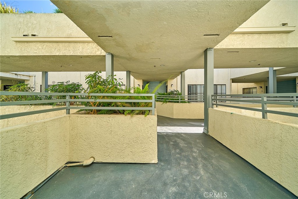 720 West 4th Street, Unit 305 Long Beach, CA 90802 - Photo 31 of 52 a view of a kitchen with kitchen island and stainless steel appliances