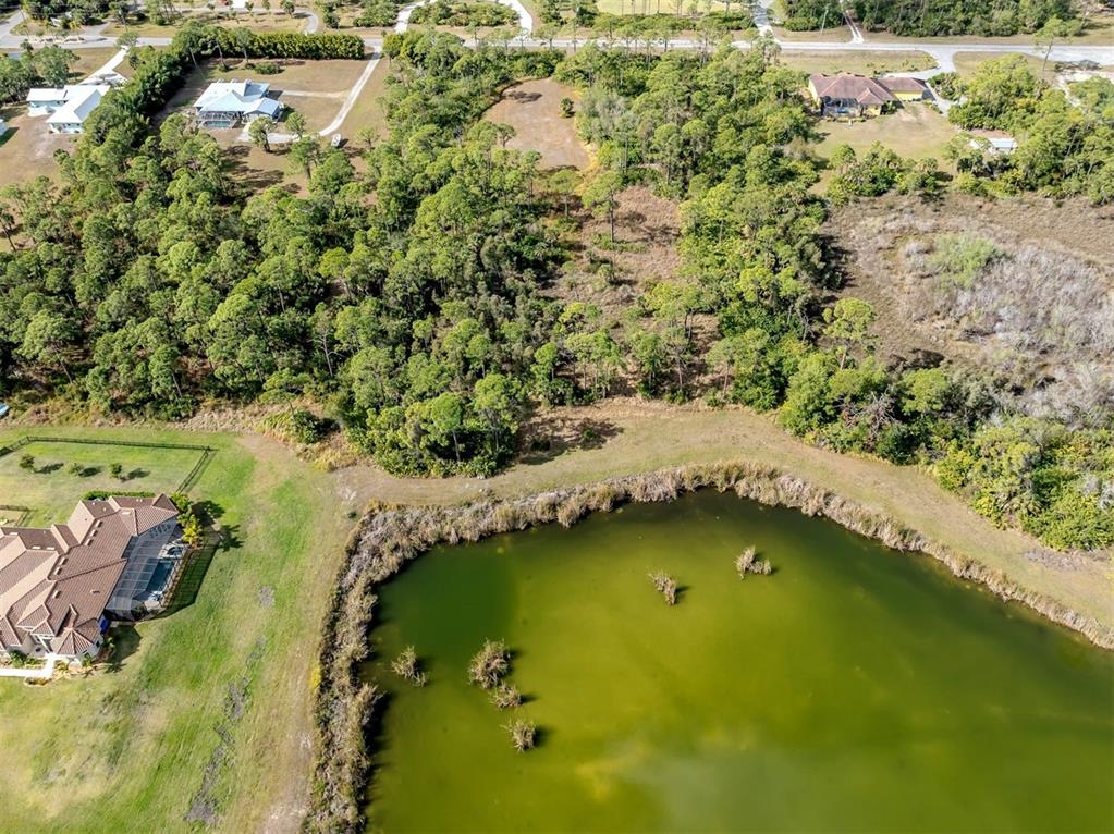 9008 Falcon Court Venice, FL 34293 - Photo 12 of 26 an aerial view of swimming pool