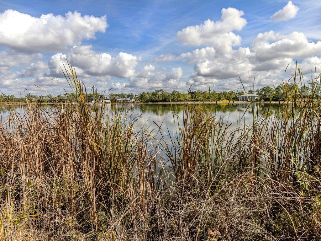9008 Falcon Court Venice, FL 34293 - Photo 9 of 26 a view of a lake
