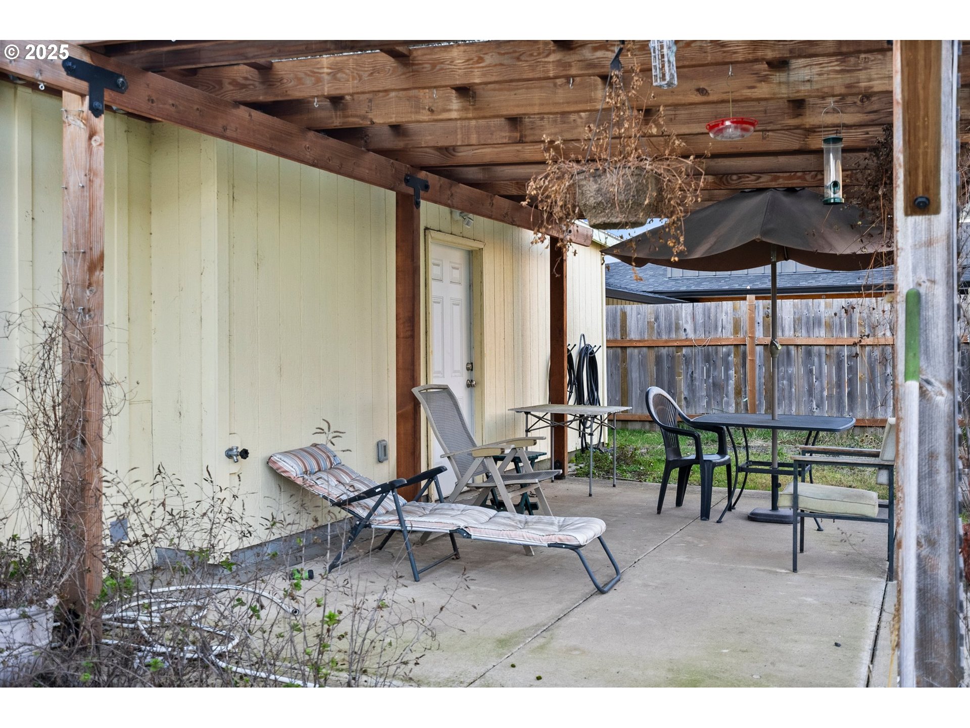 3875 East Amazon Drive Eugene, OR 97405 - Photo 28 of 33 a view of a chairs and table in the patio