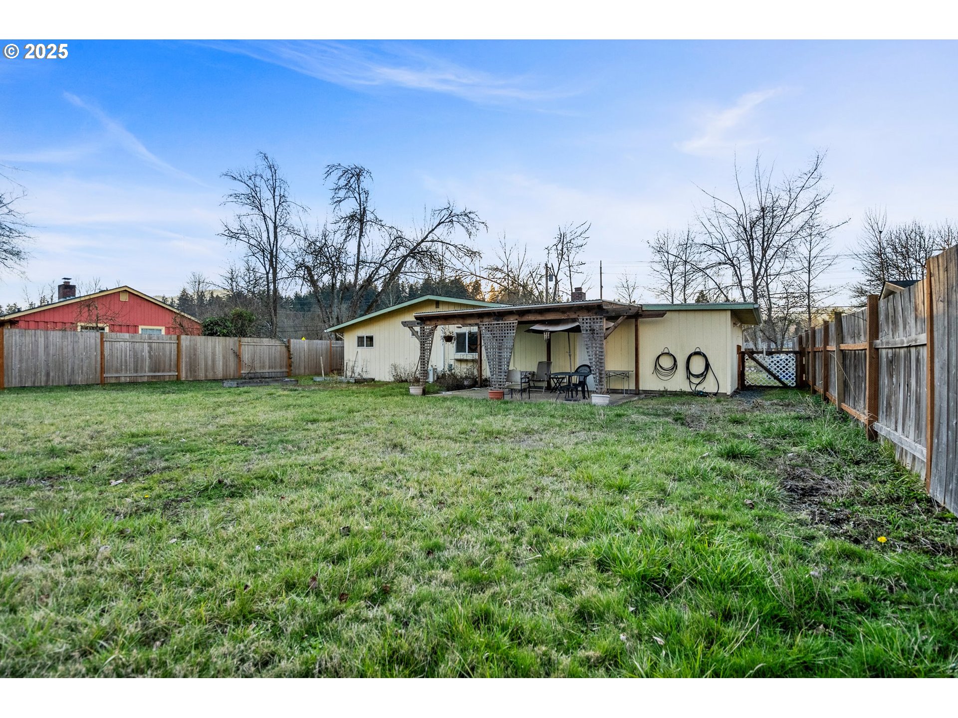 3875 East Amazon Drive Eugene, OR 97405 - Photo 29 of 33 a view of a house with a yard