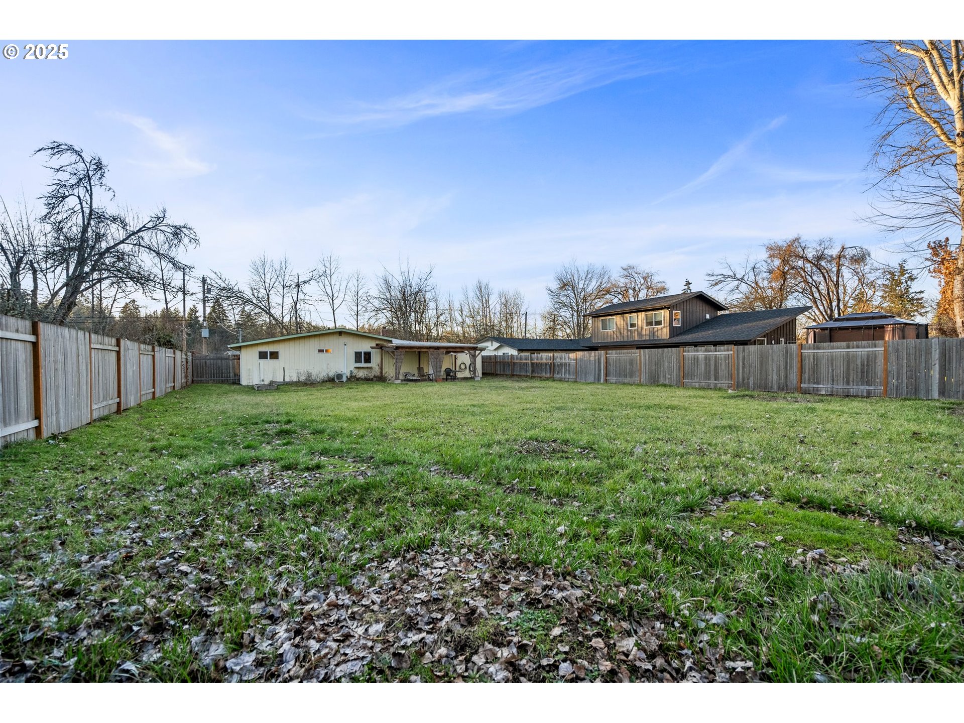3875 East Amazon Drive Eugene, OR 97405 - Photo 31 of 33 a view of a backyard with large trees
