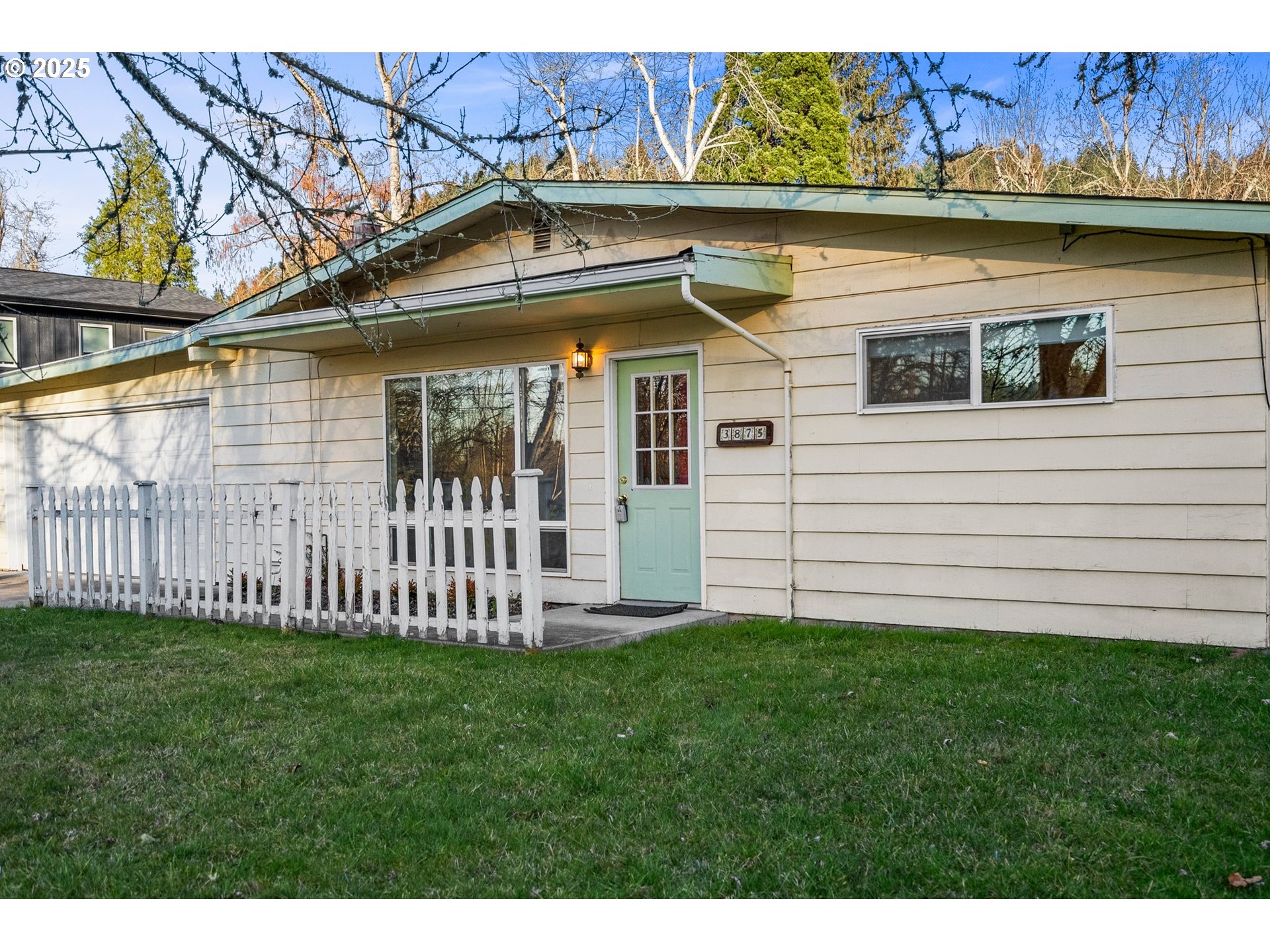 3875 East Amazon Drive Eugene, OR 97405 - Photo 5 of 33 a view of a house with a yard and sitting area
