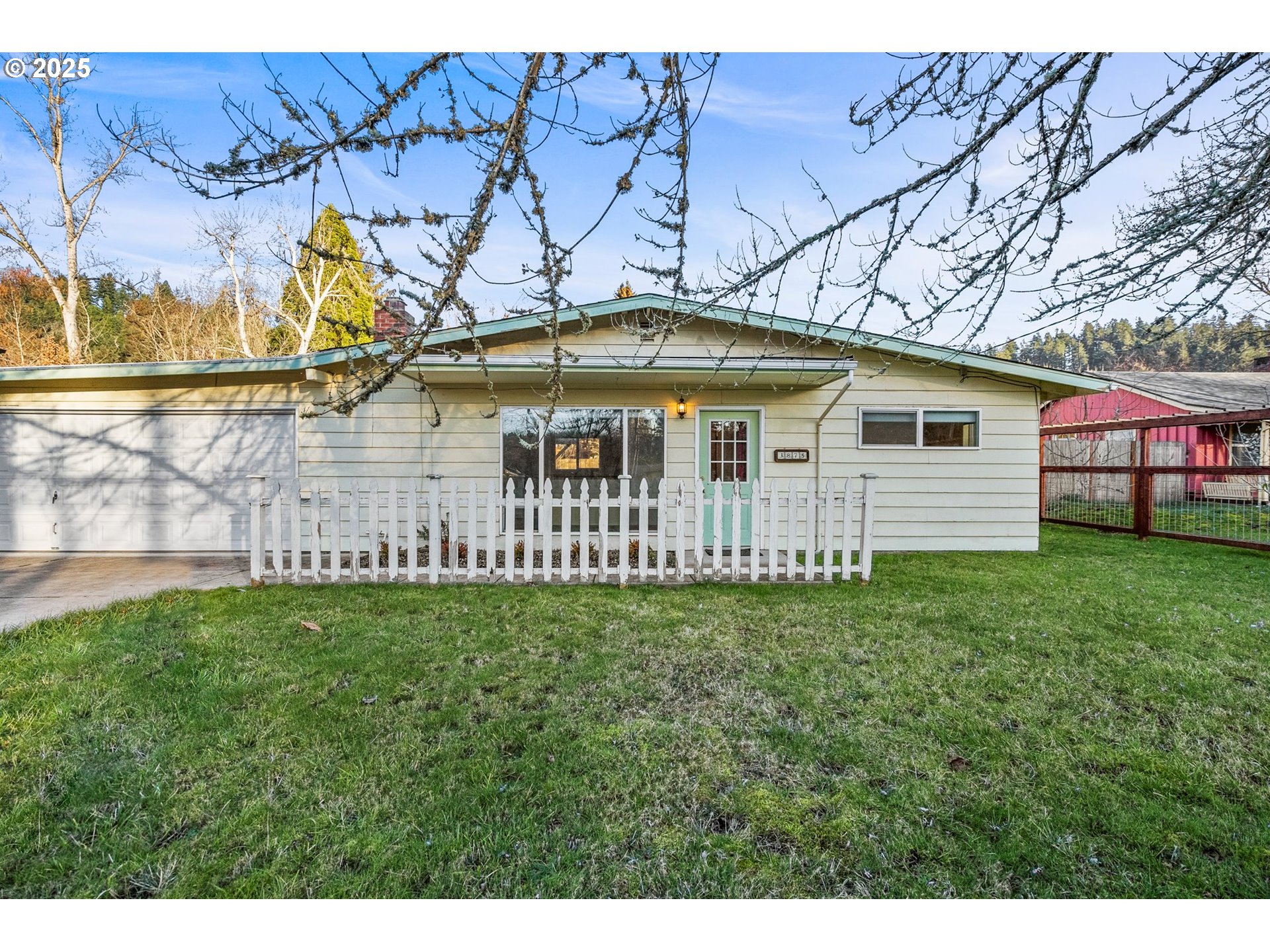 3875 East Amazon Drive Eugene, OR 97405 - Photo 6 of 33 a view of a house with a yard
