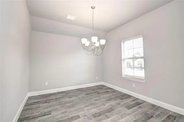 a view of a chandelier in a room