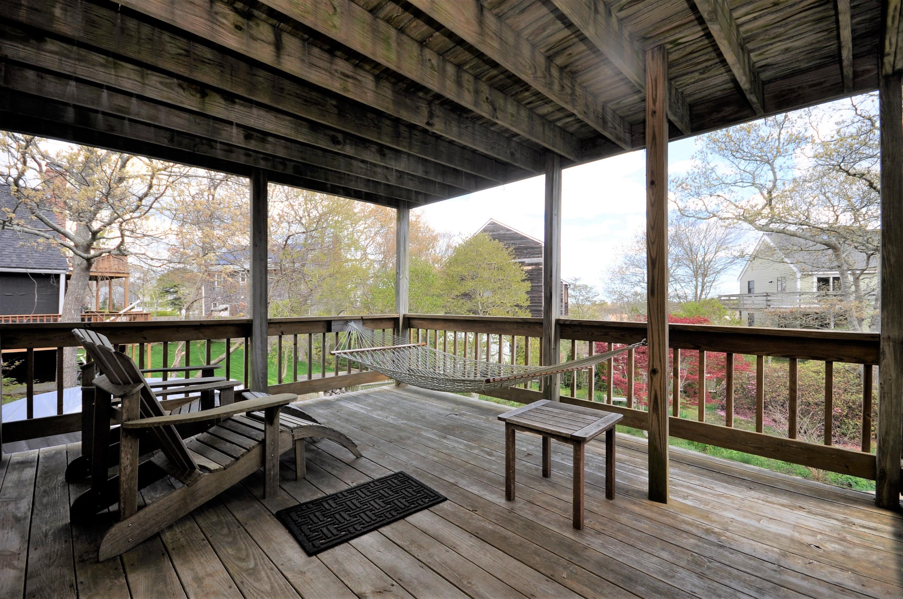 8 McGrath Road Sagamore Beach, MA 02562 - Photo 15 of 25 a view of sitting area with furniture and wooden floor