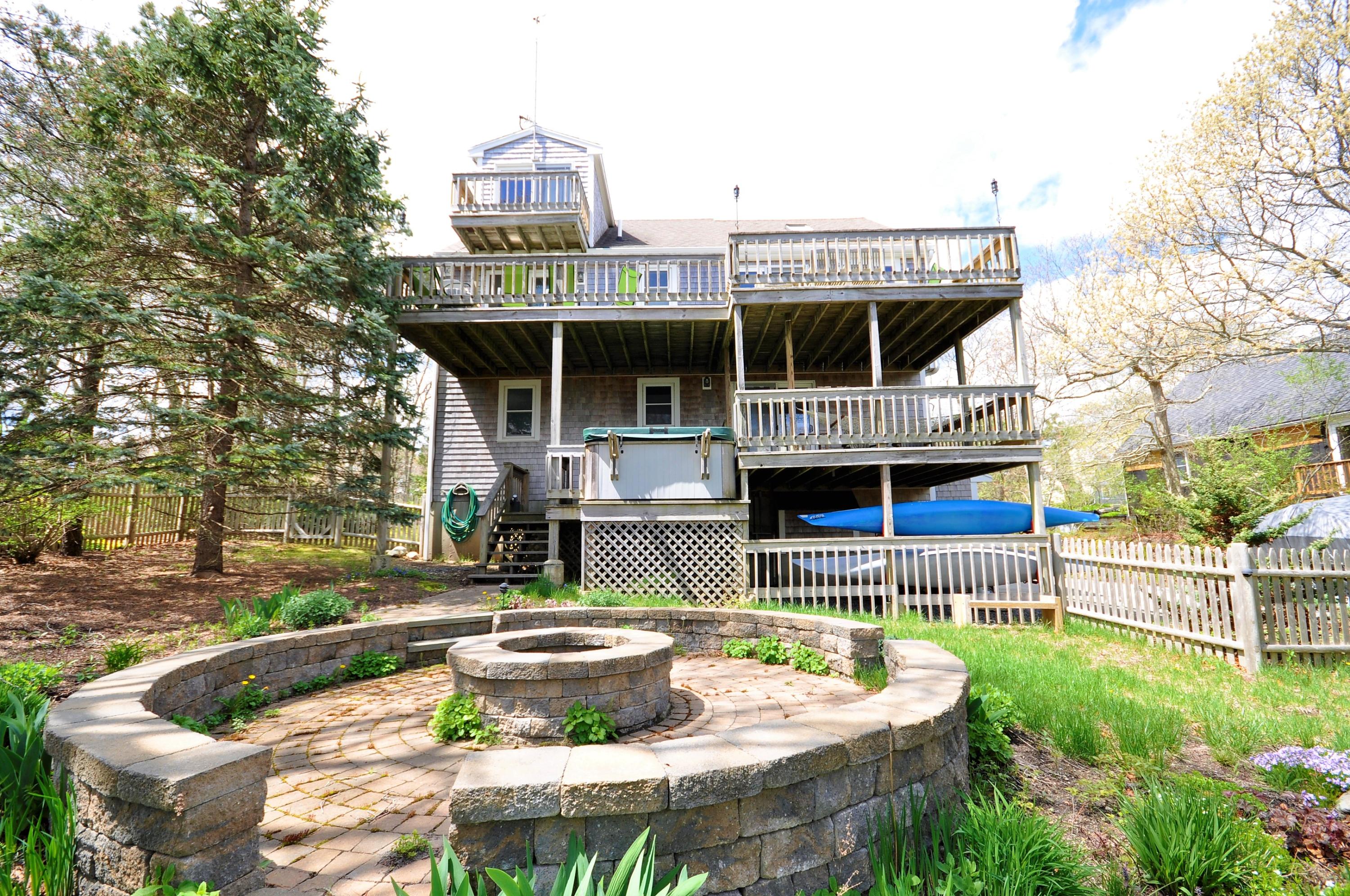 8 McGrath Road Sagamore Beach, MA 02562 - Photo 23 of 25 a view of house with backyard outdoor seating and barbeque oven