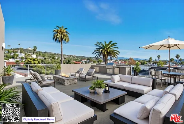 a view of a patio with couches and chairs