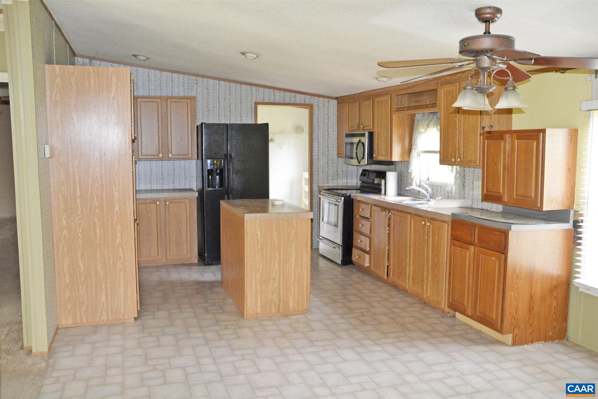 470 High Bridge Drive Rice, VA 23966 - Photo 3 of 16 a kitchen with refrigerator cabinets and furniture