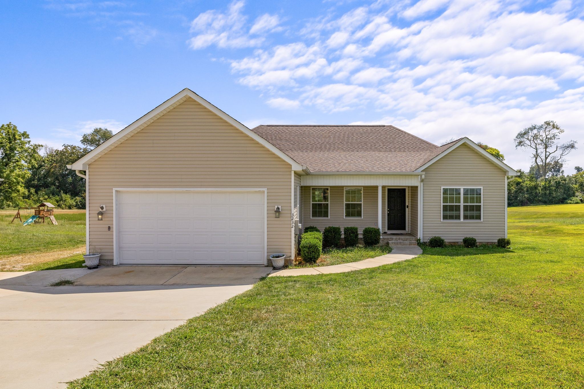 3232 Owl Hollow Road Belvidere, TN 37306 - Photo 25 of 43 a front view of house with yard and green space