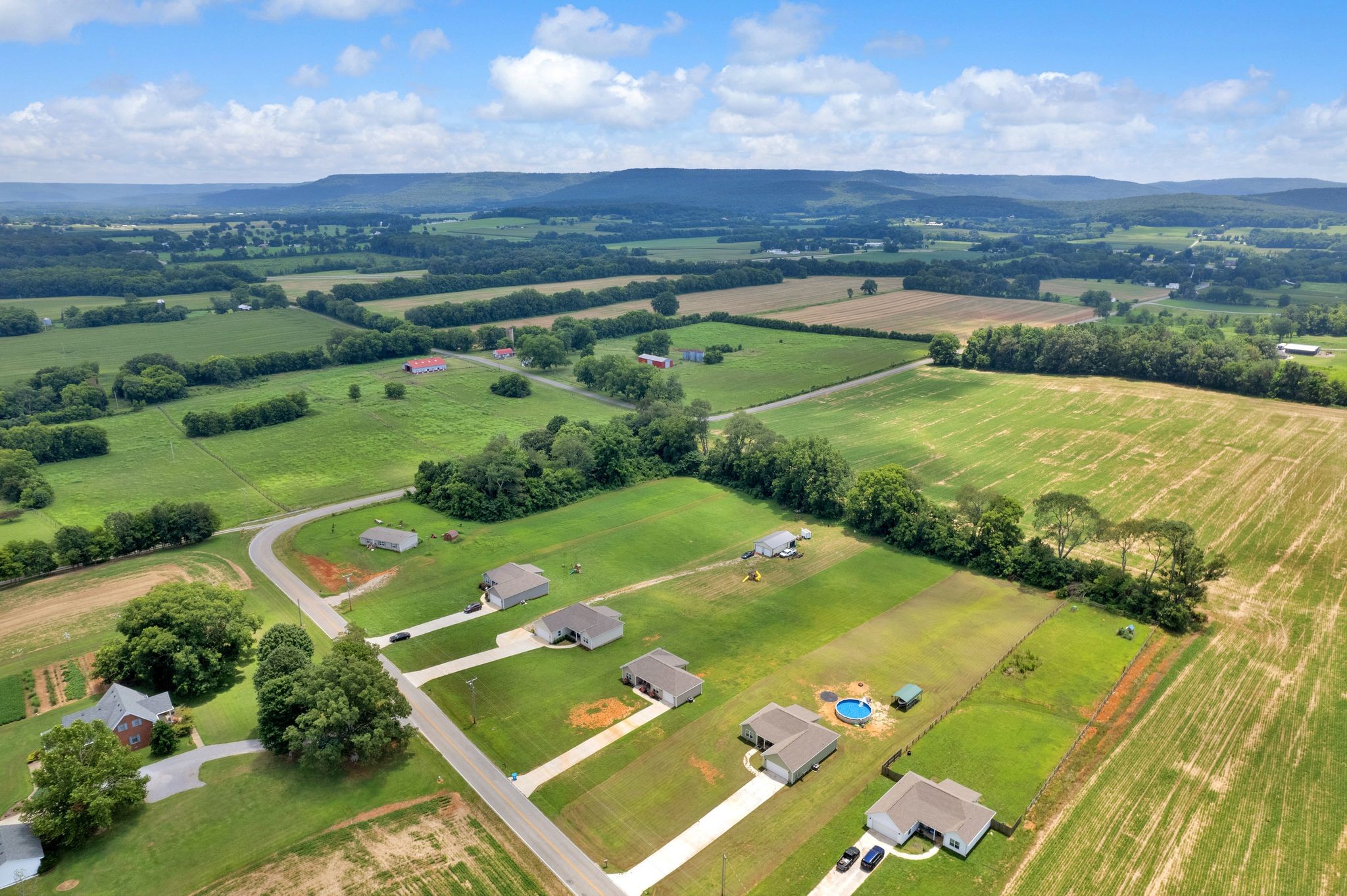 3232 Owl Hollow Road Belvidere, TN 37306 - Photo 34 of 43 an aerial view of a golf course with lawn chairs