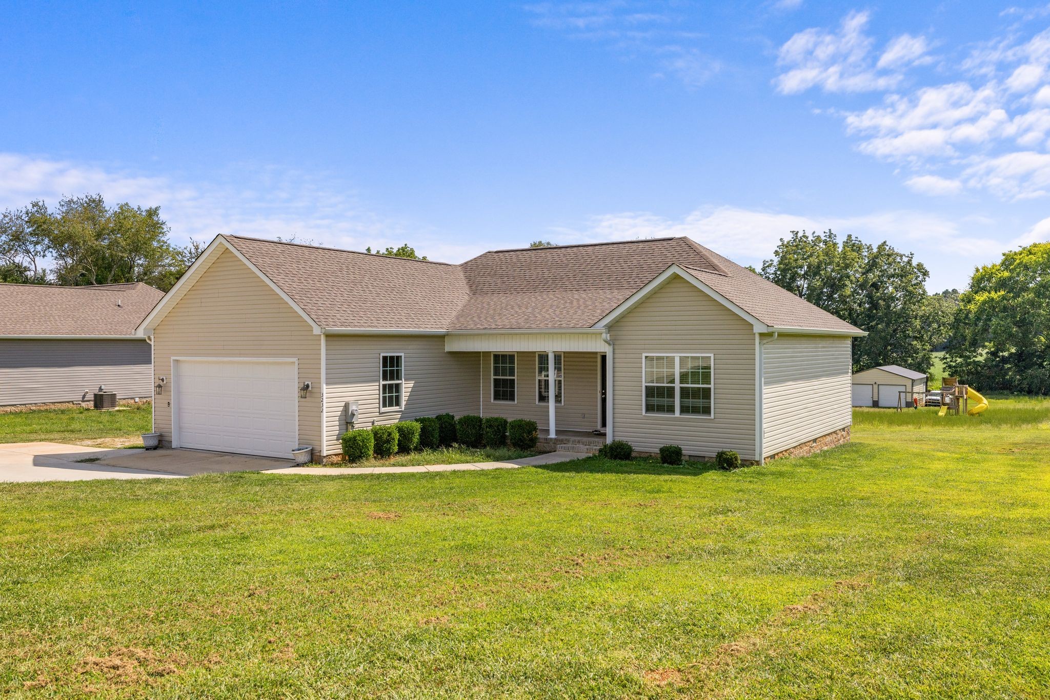 3232 Owl Hollow Road Belvidere, TN 37306 - Photo 42 of 43 a view of a house with a yard
