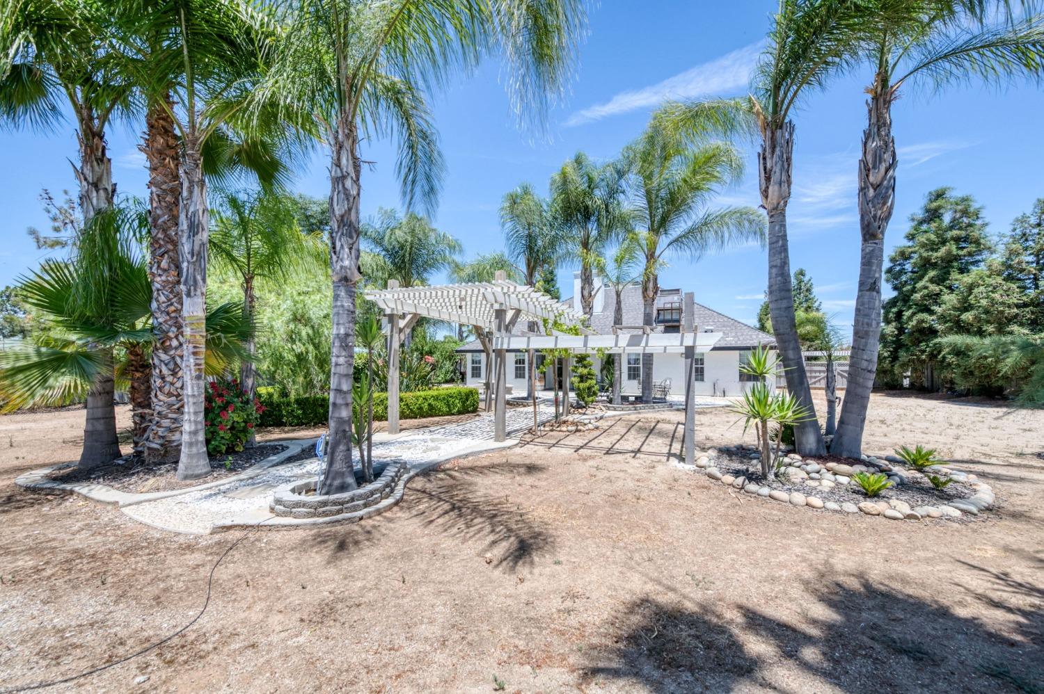 25106 Ave 18 Madera, CA 93638 - Photo 43 of 66 a view of a park with palm trees