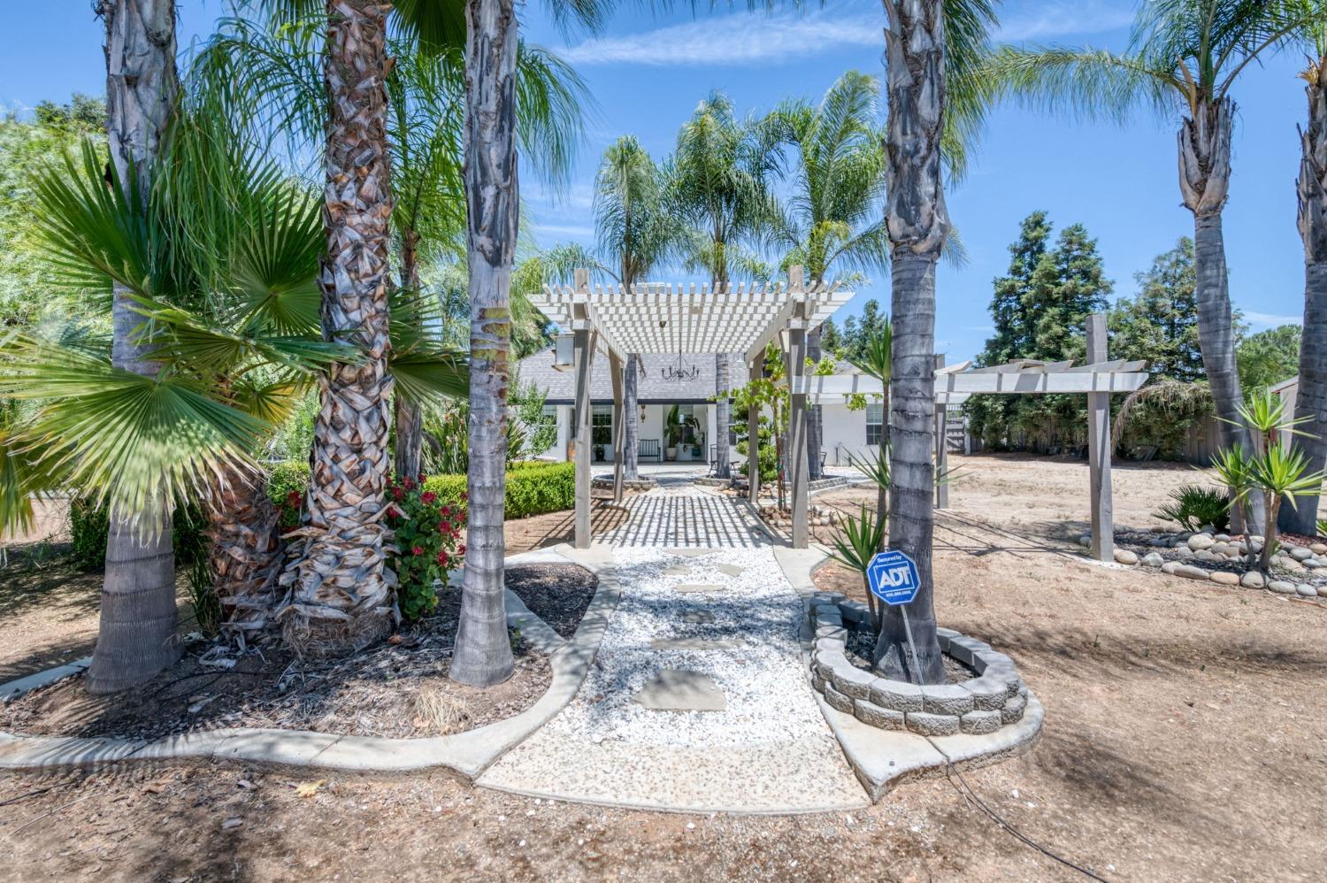 25106 Ave 18 Madera, CA 93638 - Photo 44 of 66 a view of yard with swimming pool and furniture