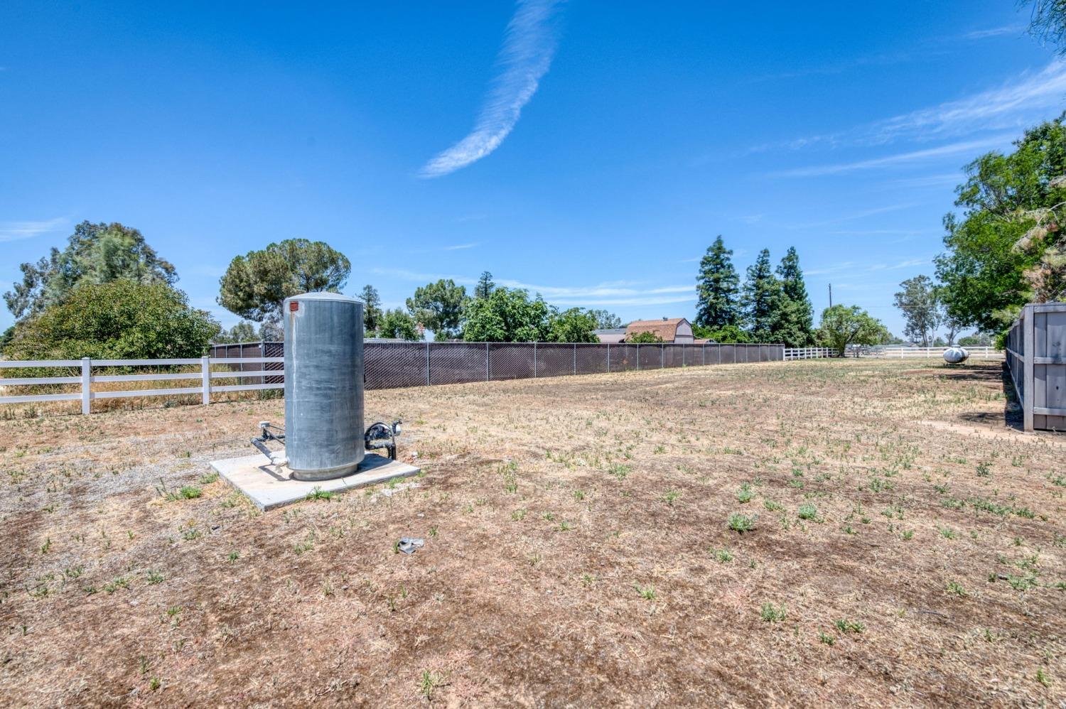25106 Ave 18 Madera, CA 93638 - Photo 45 of 66 a view of a outdoor space with a street