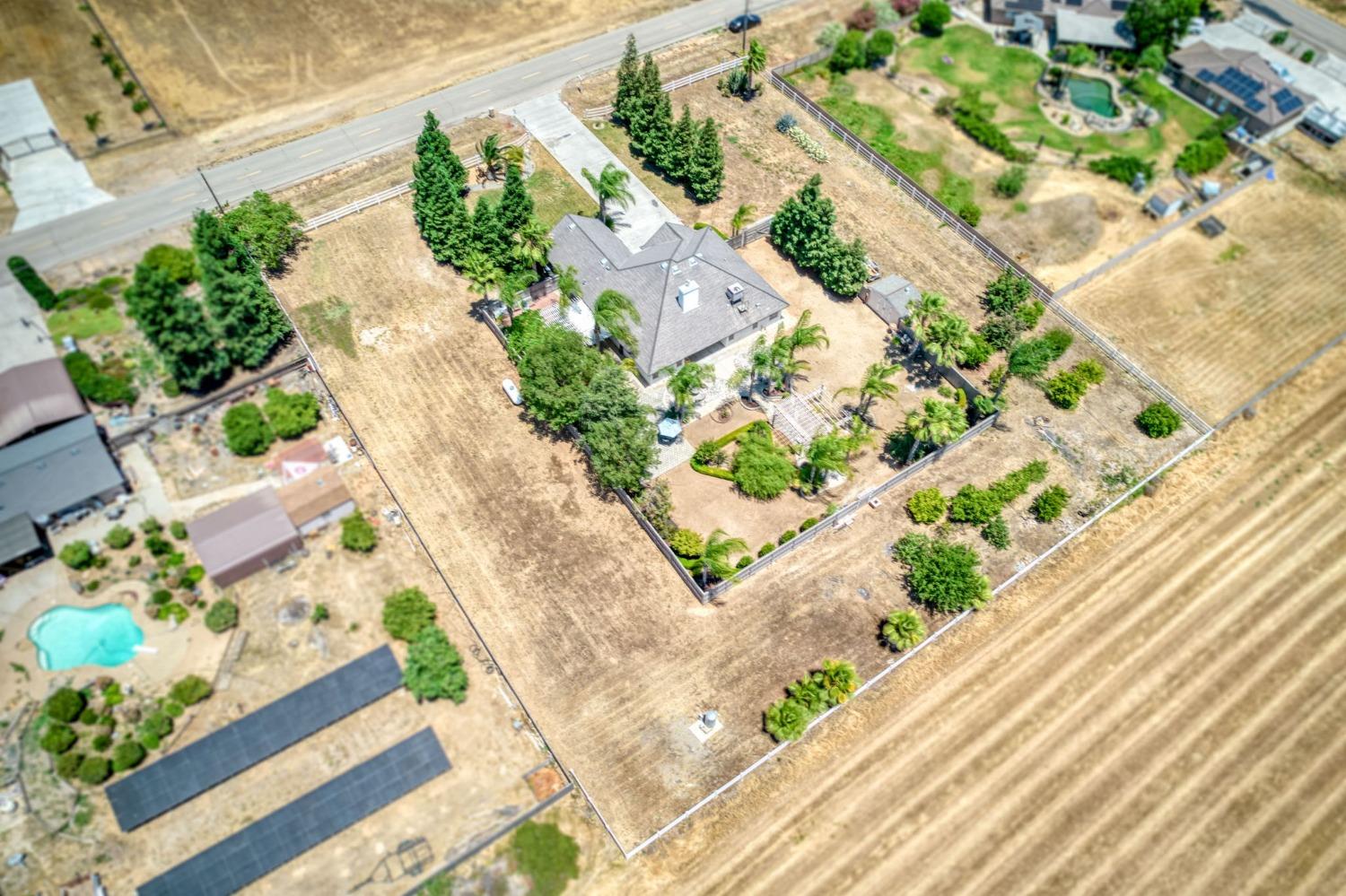 25106 Ave 18 Madera, CA 93638 - Photo 53 of 66 a view of a garden with flowers