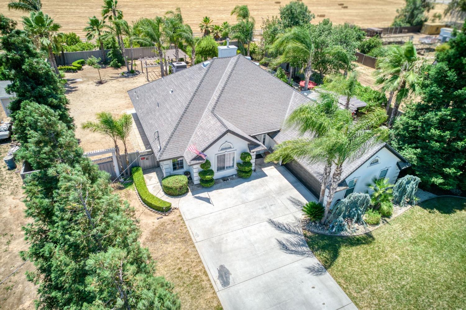 25106 Ave 18 Madera, CA 93638 - Photo 63 of 66 an aerial view of a house