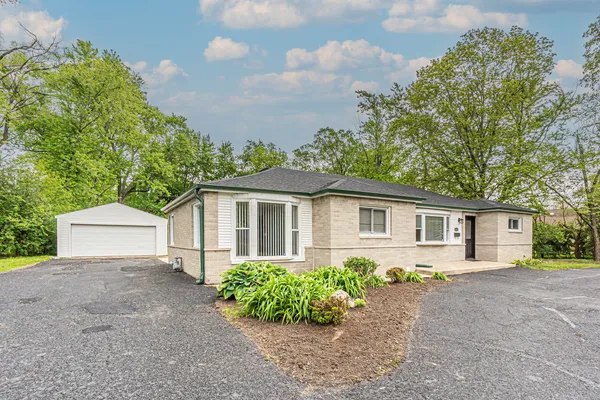 front view of house with a yard