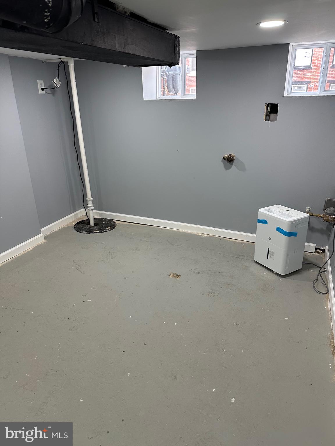 1002 North Pine Street Wilmington, DE 19801 - Photo 17 of 29 a view of an empty room with wooden floor and a window