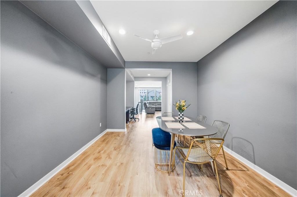8847 Jacaranda Avenue, Unit C Montclair, CA 91763 - Photo 14 of 34 a view of a dining room with furniture and wooden floor