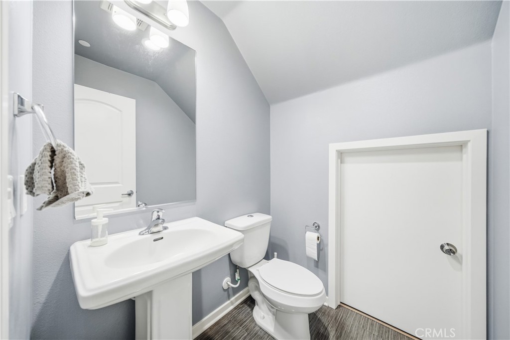 8847 Jacaranda Avenue, Unit C Montclair, CA 91763 - Photo 15 of 34 a bathroom with a sink toilet and mirror