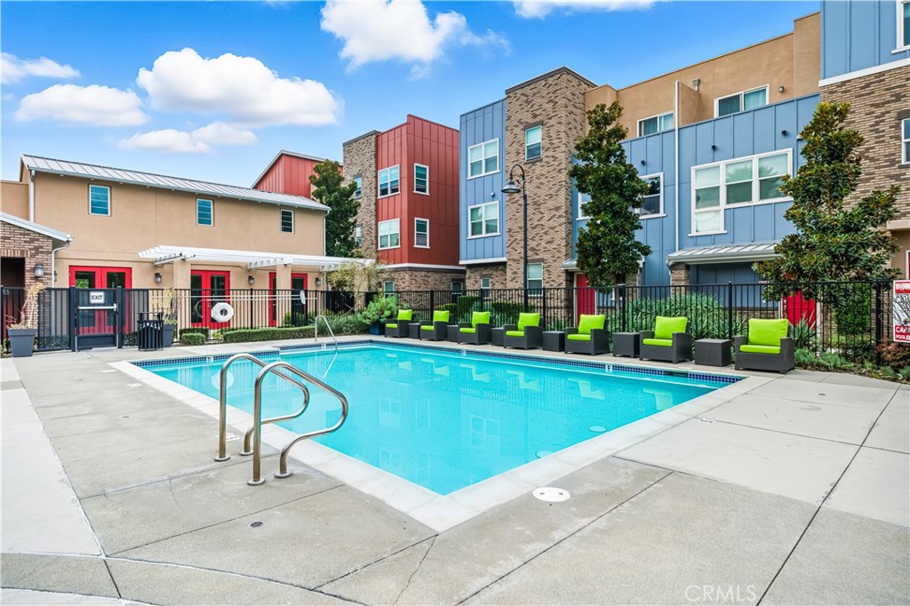 8847 Jacaranda Avenue, Unit C Montclair, CA 91763 - Photo 31 of 34 a view of a building with a swimming pool