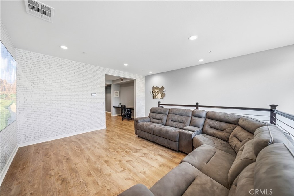 8847 Jacaranda Avenue, Unit C Montclair, CA 91763 - Photo 9 of 34 a living room with furniture
