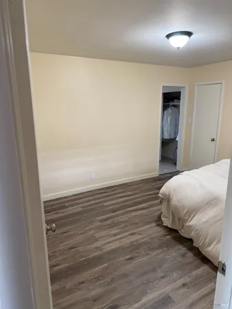 a bathroom with a toilet and shower