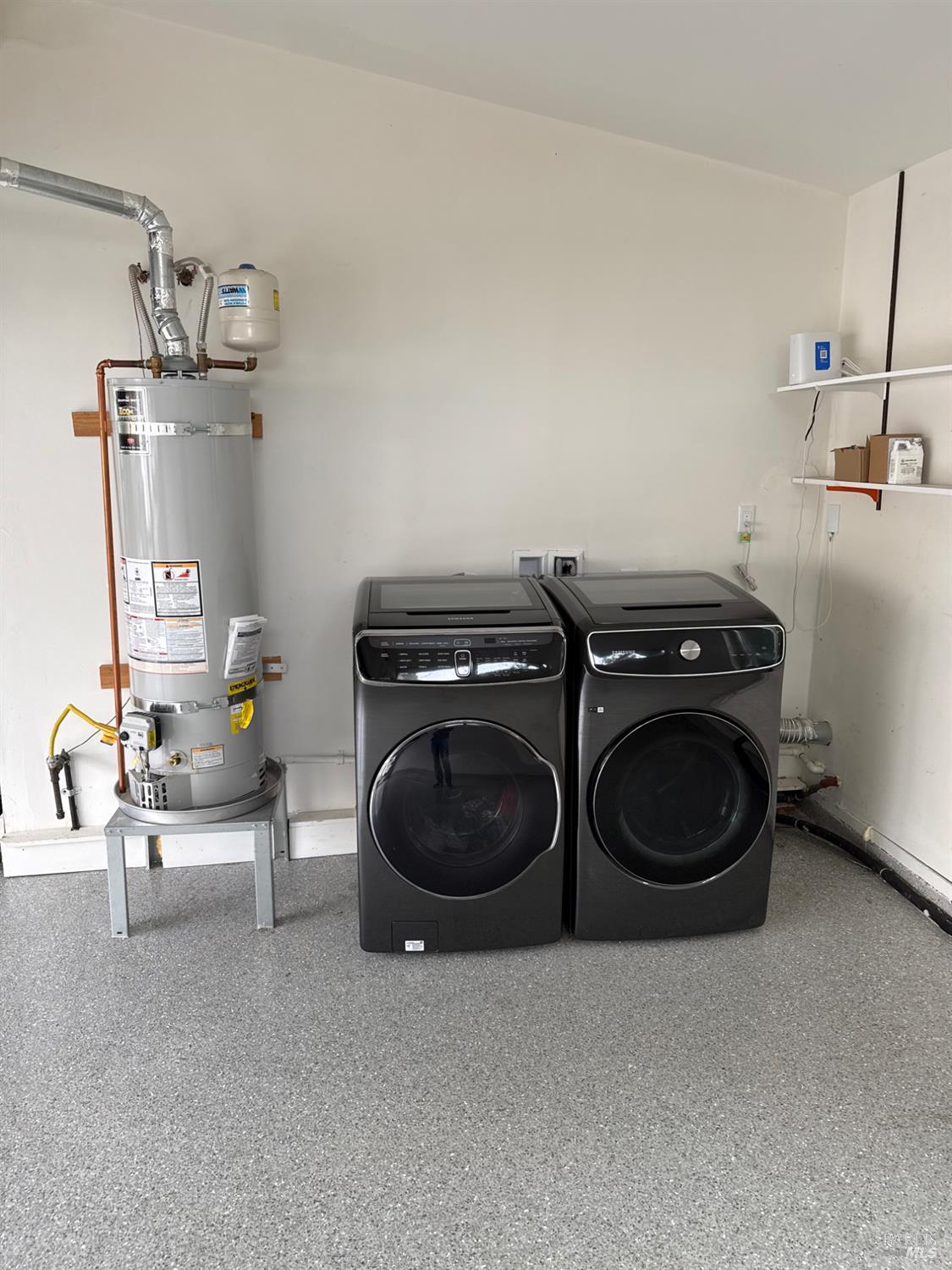 16 Harbor View Court San Rafael, CA 94901 - Photo 10 of 20 a utility room with sink dryer and washer