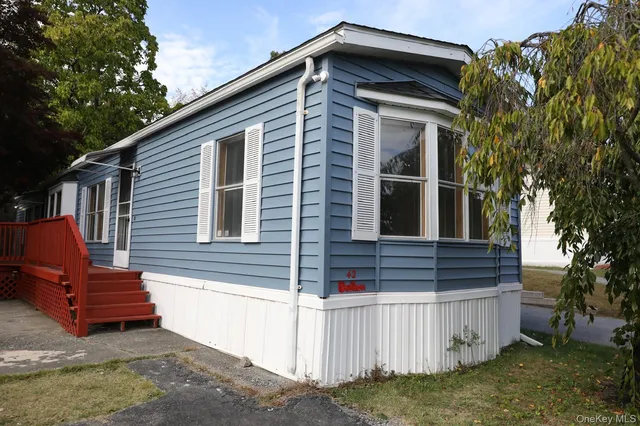 a front view of a house with balcony