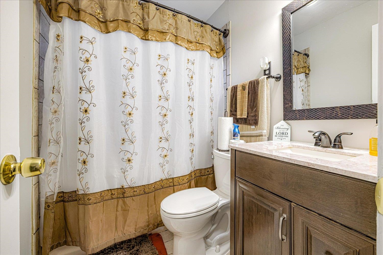 3128 Cherry Road Memphis, TN 38118 - Photo 25 of 40 a bathroom with a sink a toilet and shower