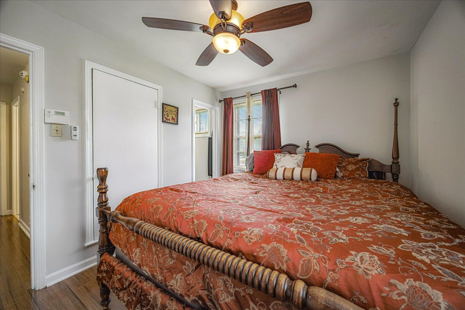 3128 Cherry Road Memphis, TN 38118 - Photo 30 of 40 a bedroom with a bed and a chandelier