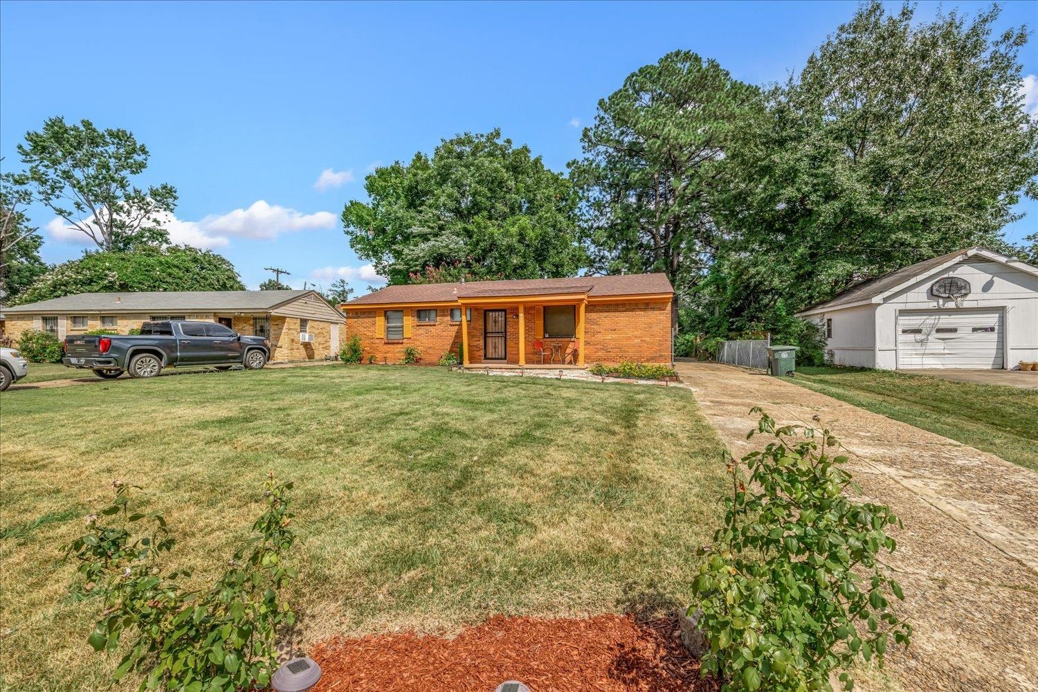 3128 Cherry Road Memphis, TN 38118 - Photo 5 of 40 a house view with a garden space