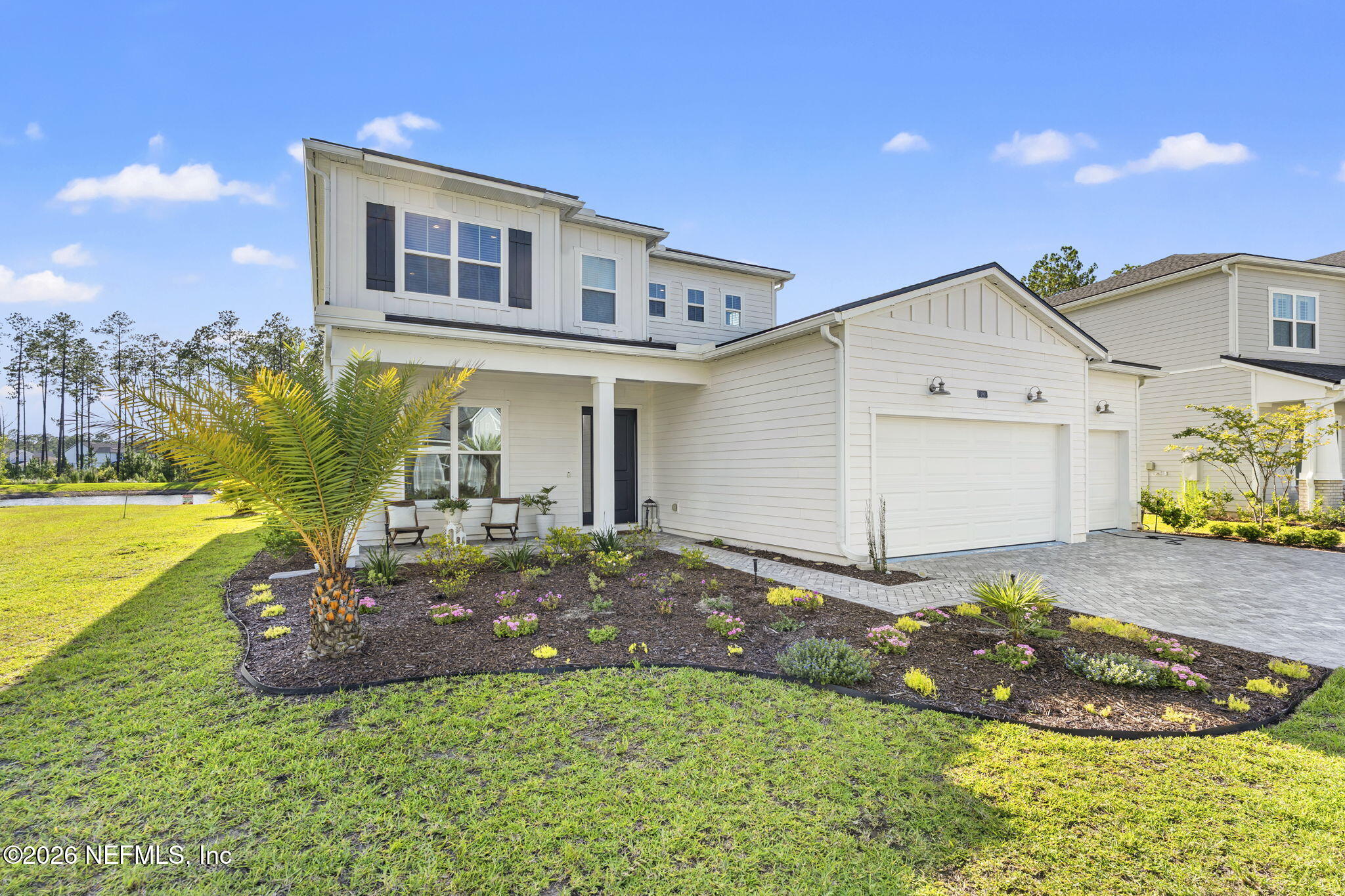 101 Elm Br Road St. Johns, FL 32259 - Photo 3 of 77 a front view of a house with a garden and yard