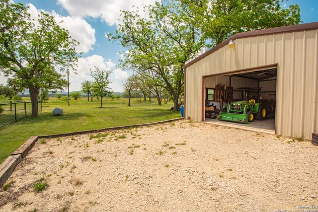 an aerial view of a house with mountain view