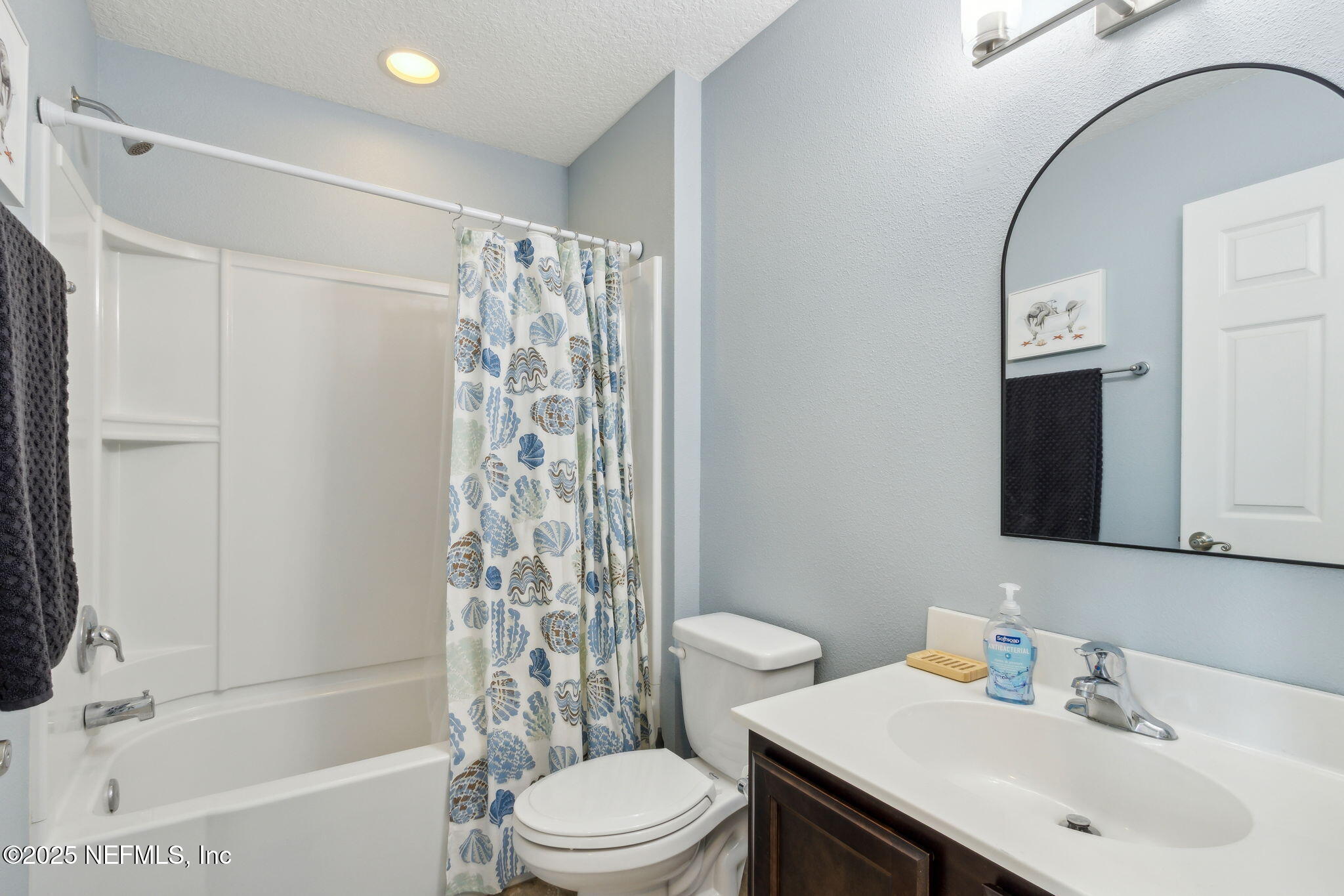 95152 Cypress Trail Fernandina Beach, FL 32034 - Photo 24 of 29 a bathroom with a sink toilet and shower