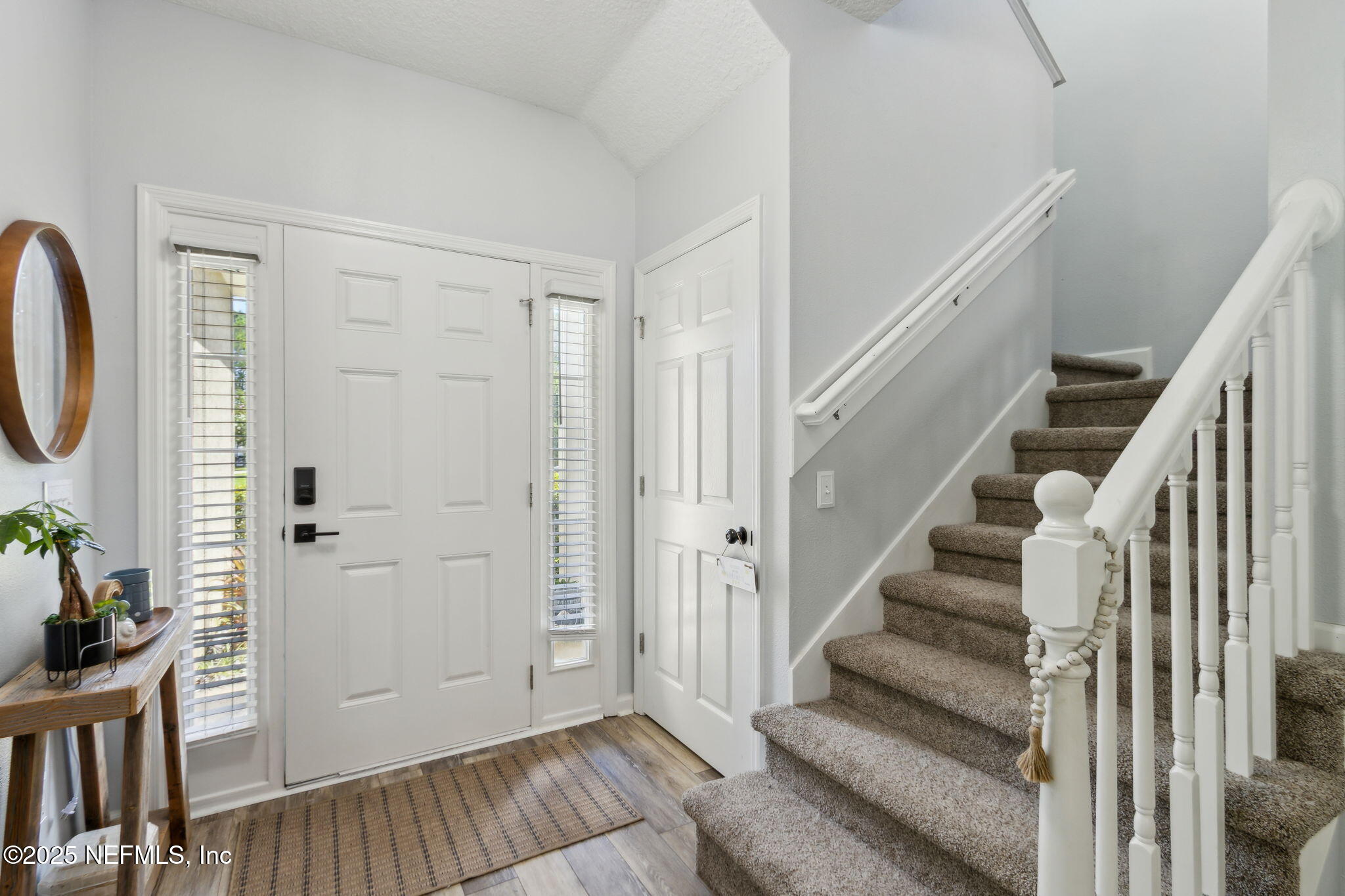 95152 Cypress Trail Fernandina Beach, FL 32034 - Photo 6 of 29 a view of entryway with wooden floor and stairs