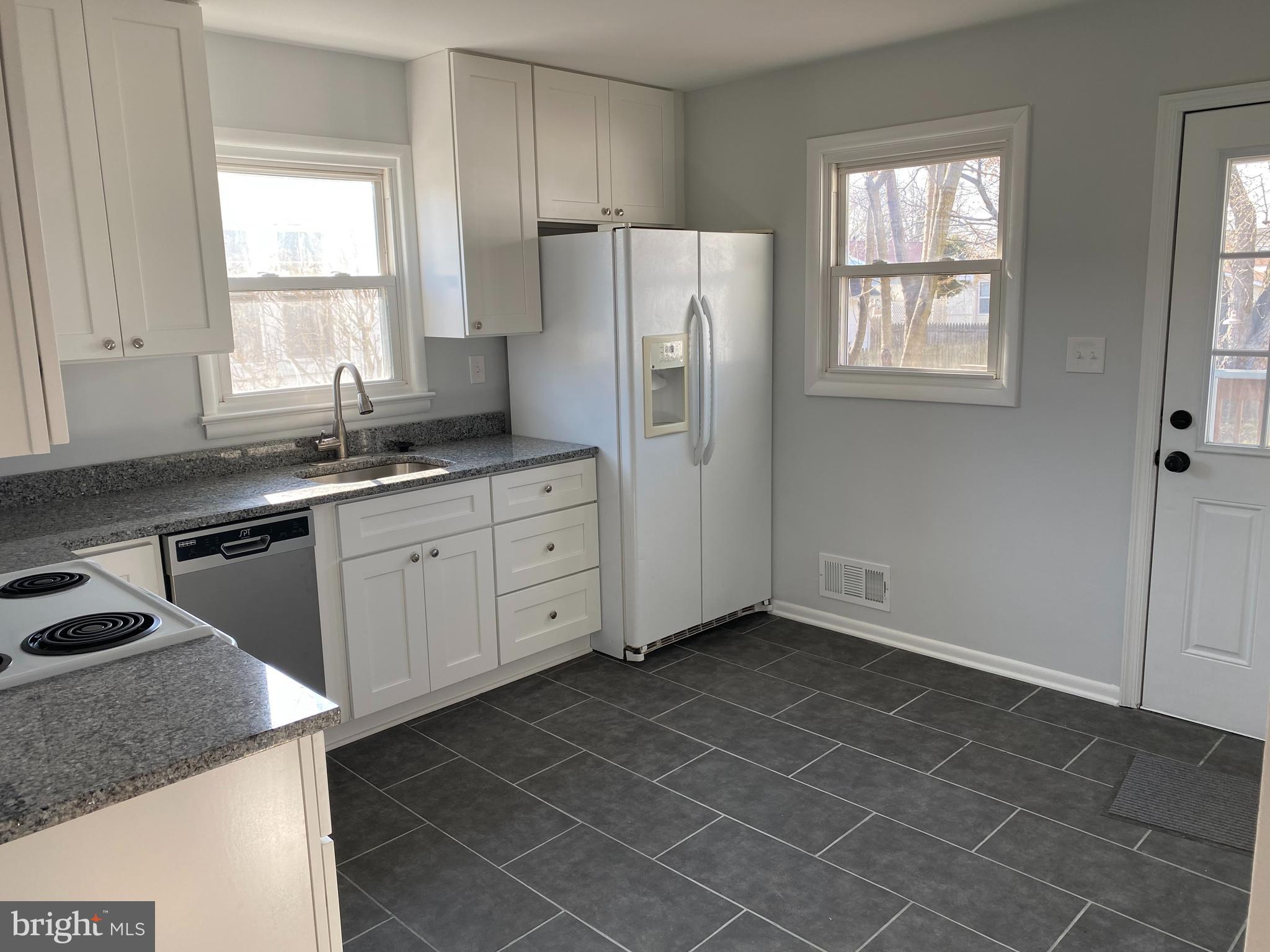 224 Wanda Road Pasadena, MD 21122 - Photo 5 of 33 Brand new kitchen, 42" cabinets, Granite, ceramic