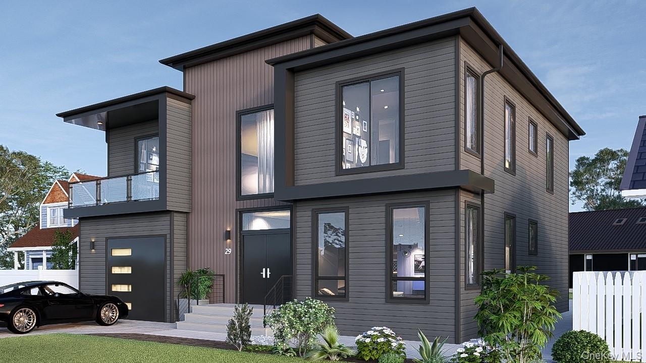 29 Raspberry Lane Levittown, NY 11756 - Photo 2 of 4 a front view of a house with garden