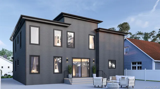 a front view of a house with glass windows