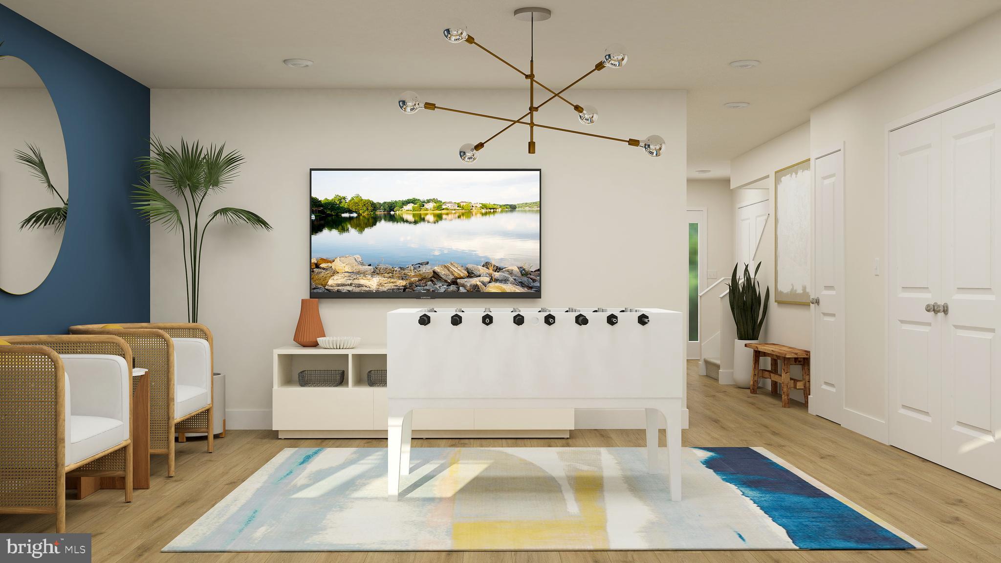 7612 Johnnycake Road Windsor Mill, MD 21244 - Photo 11 of 11 a living room with furniture and a flat screen tv