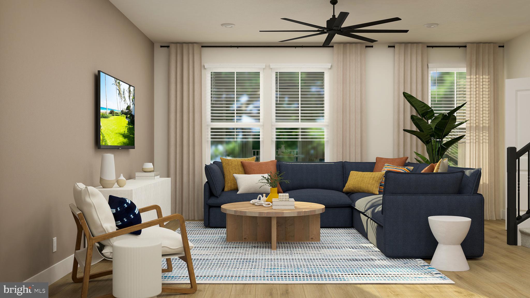 7612 Johnnycake Road Windsor Mill, MD 21244 - Photo 4 of 11 a living room with furniture and a potted plant